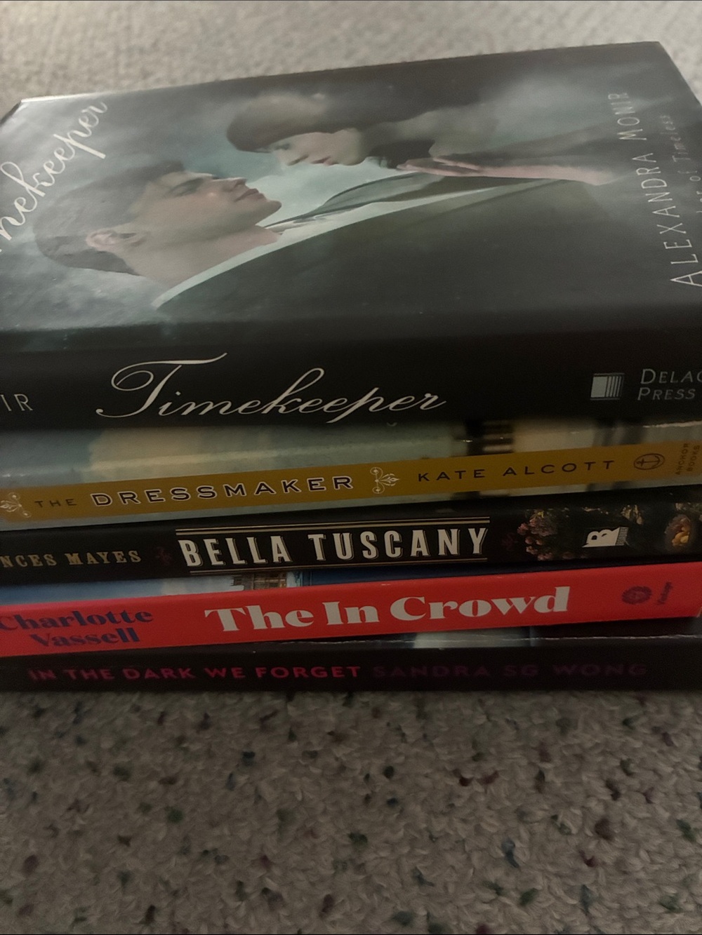 Stack of Fiction Books with Colorful Spines